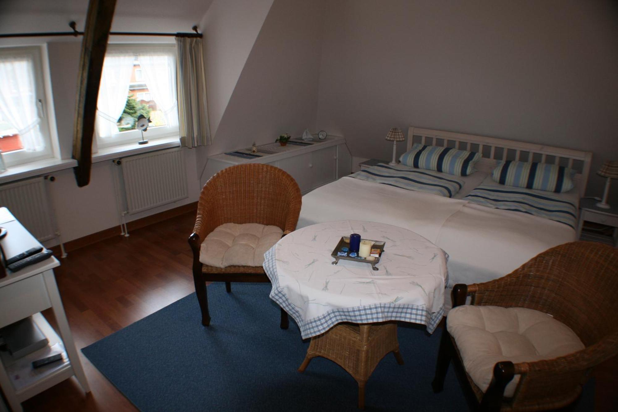 Ferienwohnungen Im Hotel Garni Zur Post Utersum Værelse billede