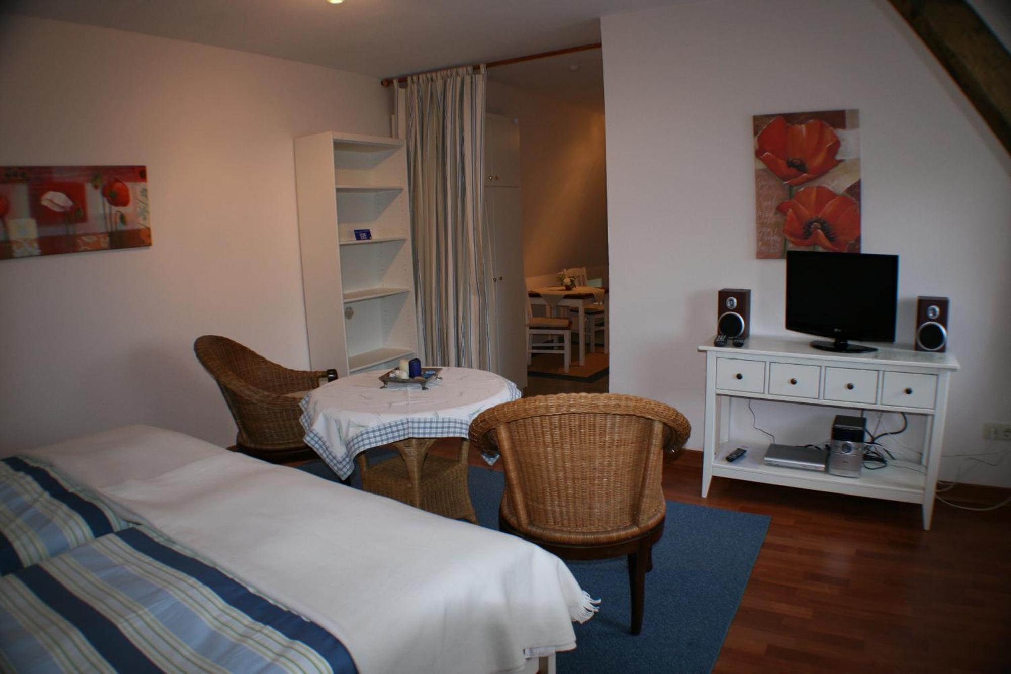 Ferienwohnungen Im Hotel Garni Zur Post Utersum Værelse billede