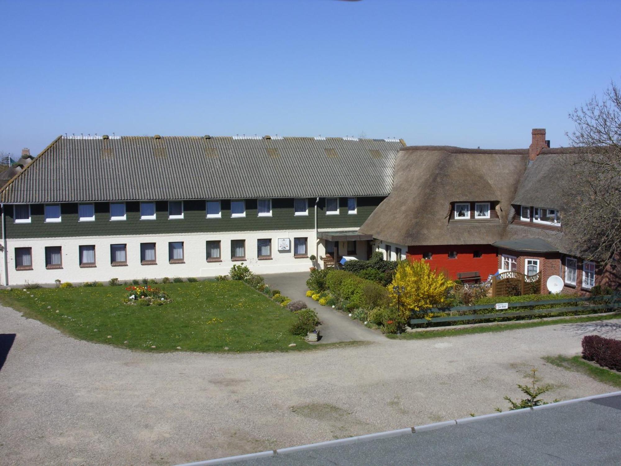 Ferienwohnungen Im Hotel Garni Zur Post Utersum Værelse billede
