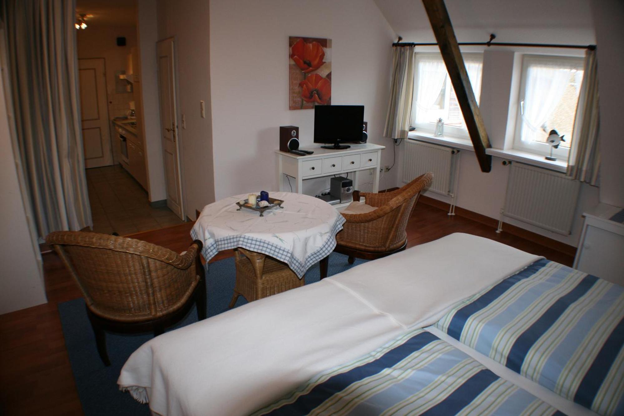 Ferienwohnungen Im Hotel Garni Zur Post Utersum Værelse billede